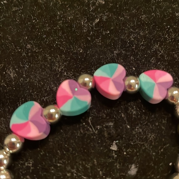7” beaded stackable stretch bracelet with 23 silver beads & 4 heart shaped beads - Picture 10 of 13